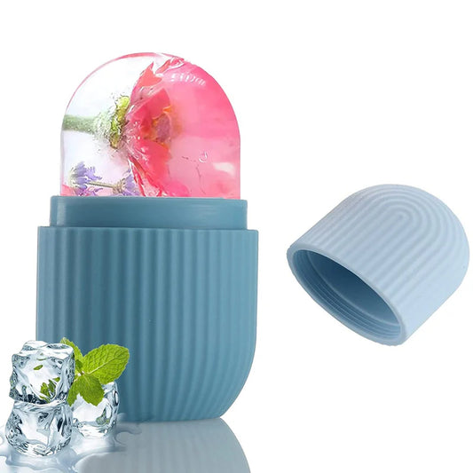 Blue silicone ice cube tray with floral ice cube and ice cubes on a white background