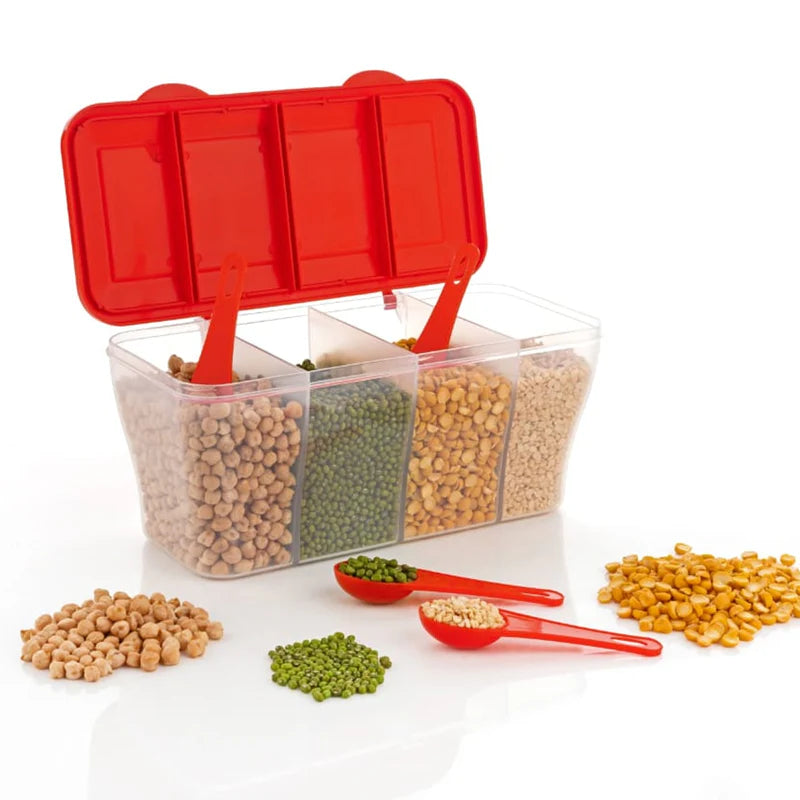 Clear container with red lid and scoops filled with various beans on a white background