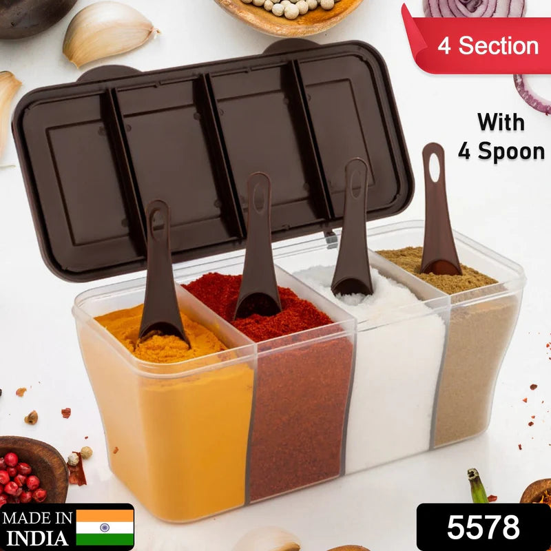 Spice container with four compartments and spoons, filled with different colored powders on a white background.